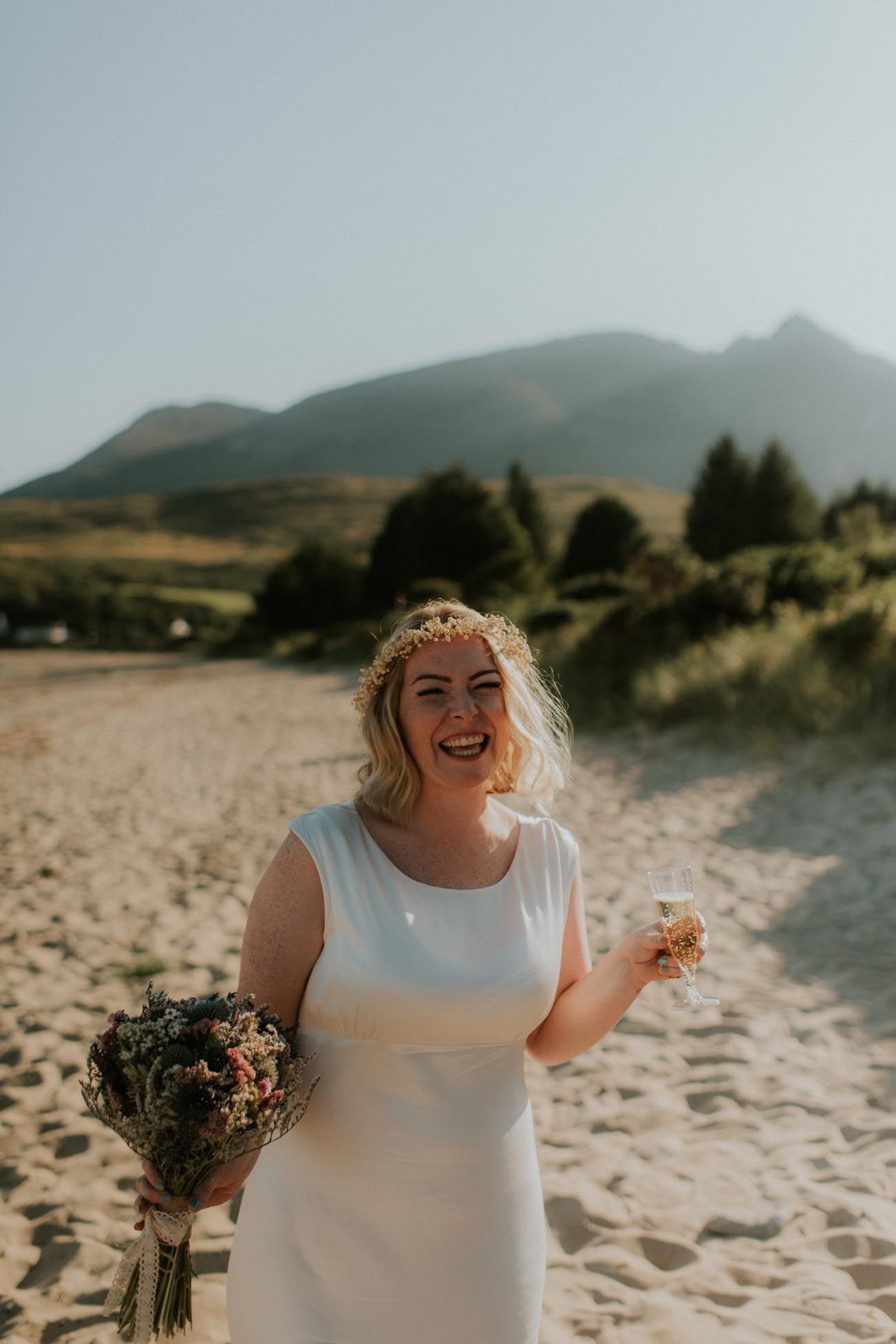 bride looking happy on beach