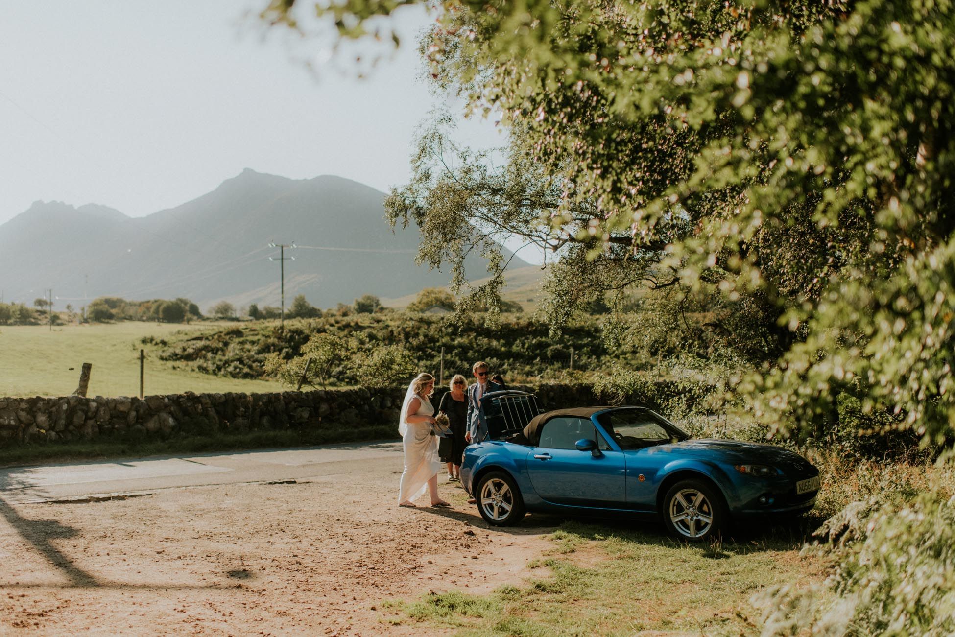 bride and groom with MX5