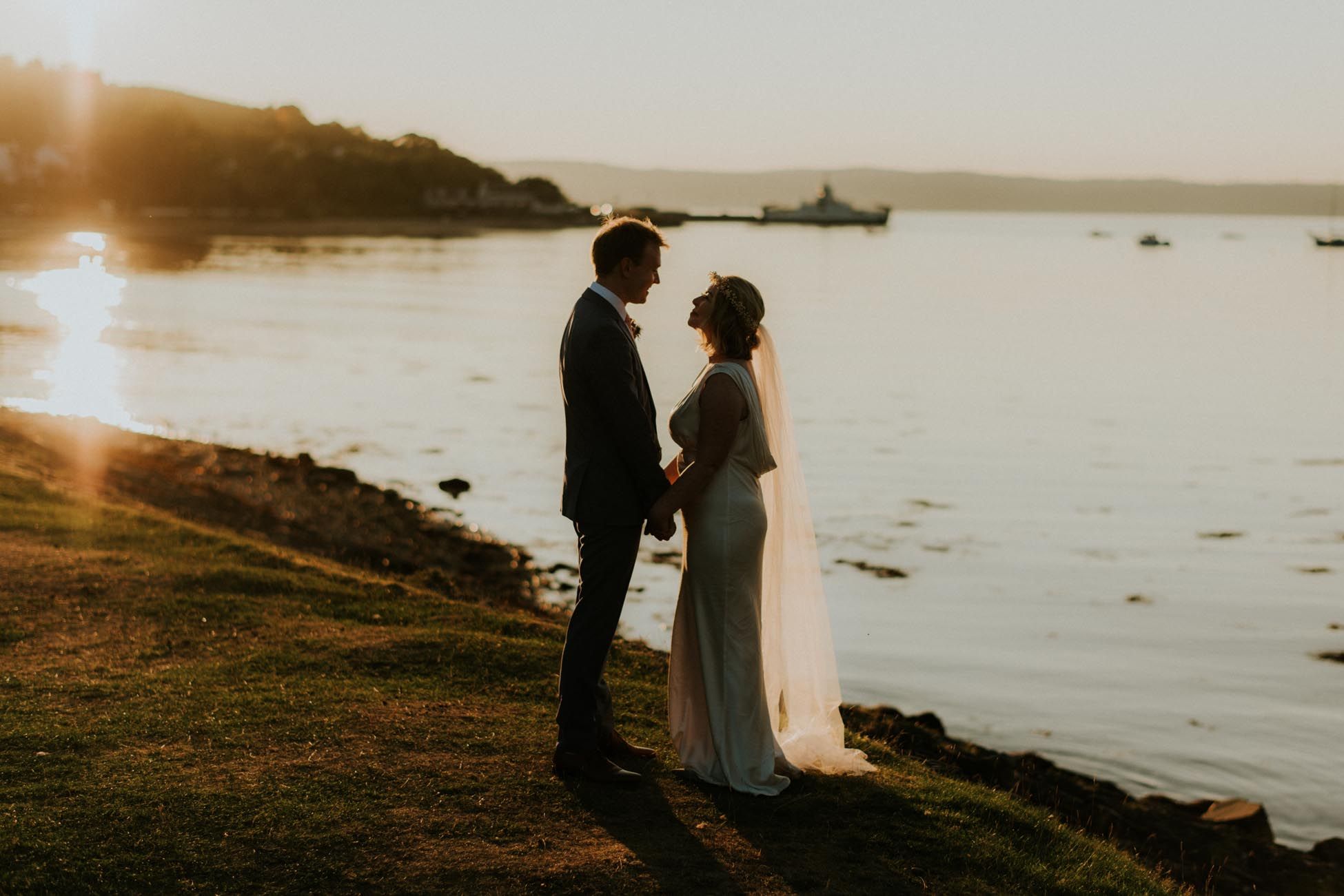 bride and groom sunset beside the sea