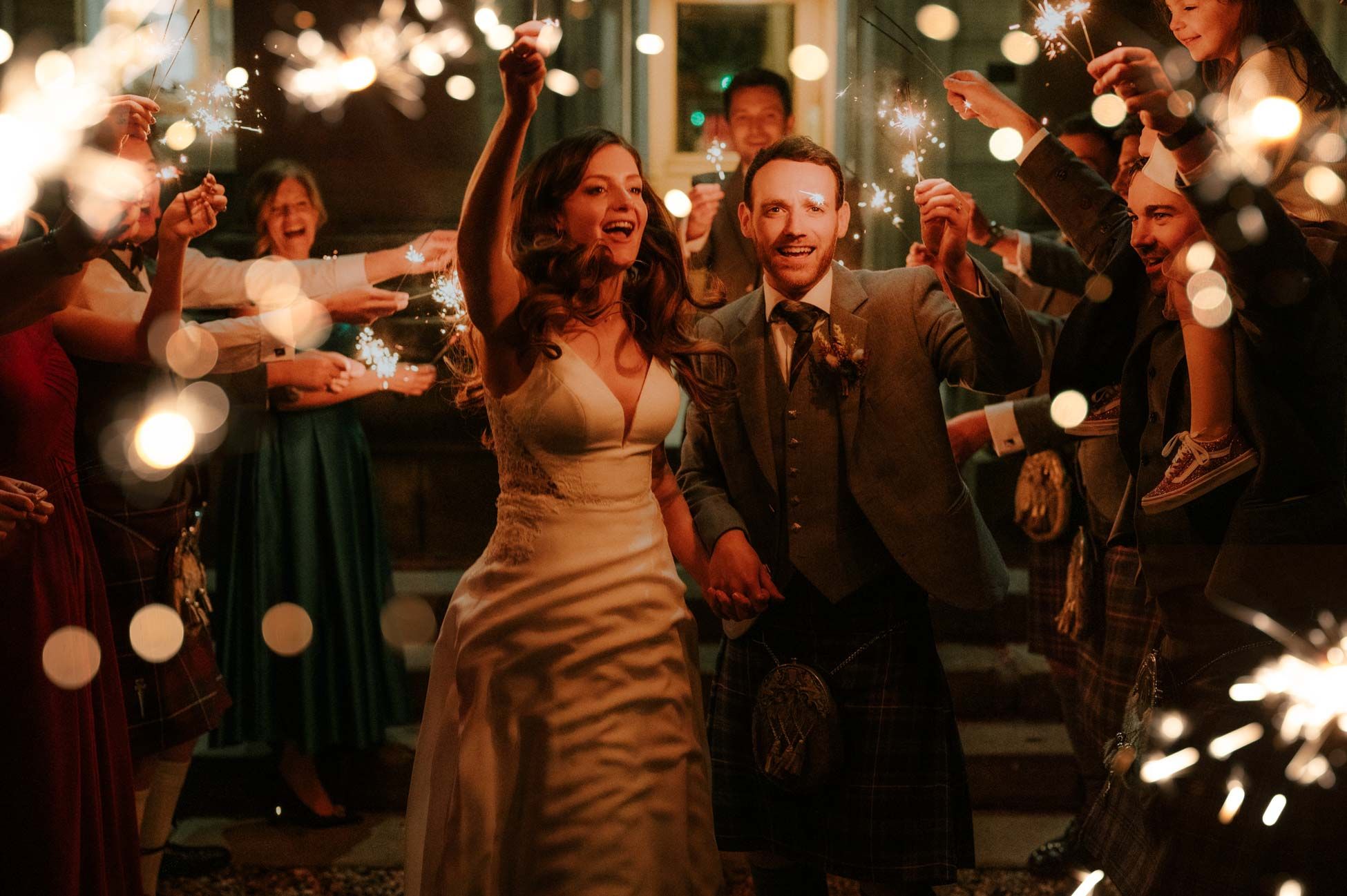 Bride and Groom with sparklers at Balbirnie house